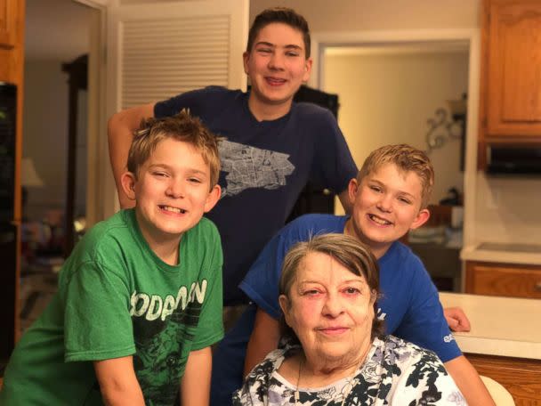 PHOTO: Scott's mother with his three sons.  (Courtesy Scott Tackacs )
