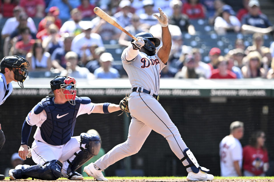 Detroit Tigers' Akil Baddoo hits an RBI single during the seventh inning of a baseball game against the Cleveland Guardians, Sunday, Aug. 20, 2023, in Cleveland. (AP Photo/Nick Cammett)