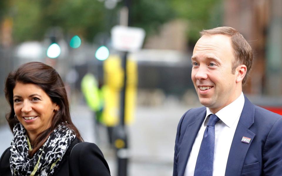 Britain's Secretary of State for Health Matt Hancock walks with his aide Gina Coladangelo outside the venue for the Conservative Party annual conference in Manchester, Britain, September 30, 2019. Picture taken September 30, 2019. REUTERS/Phil Noble - Phil Noble/REUTERS