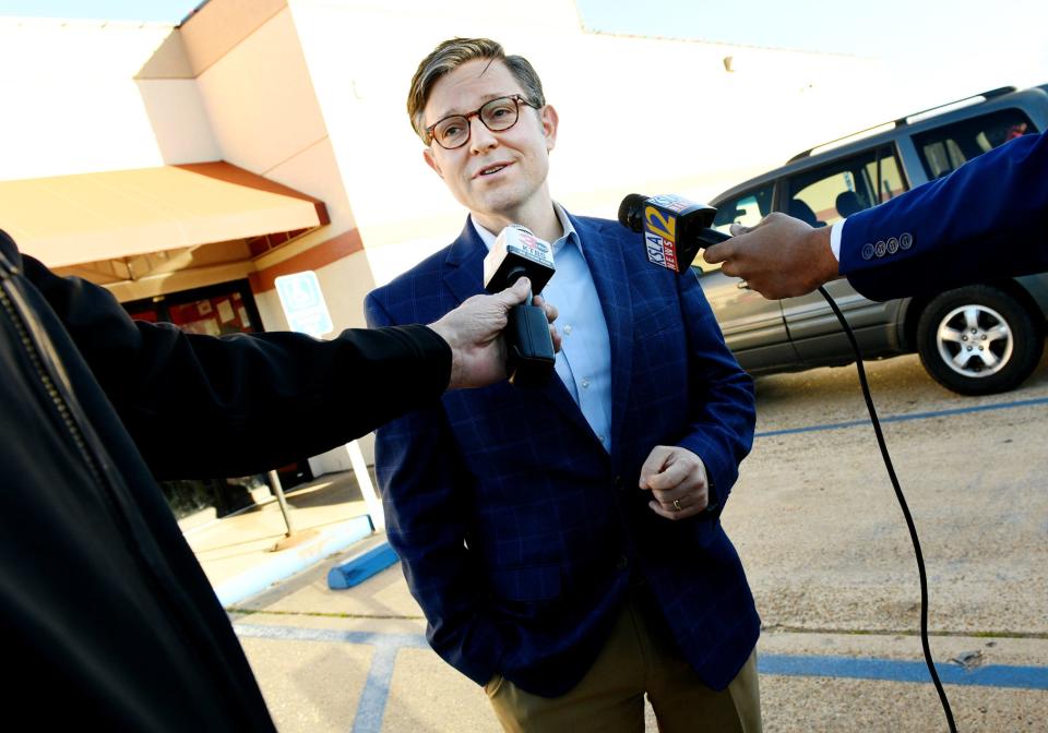 Republican House Speaker Mike Johnson talks to the press during his visit to Strawn's Eat Shop Too Sunday morning, December 10, 2023.