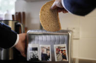 Dominic Watters, a single dad and founder of the Food is Care campaign, puts a piece of bread in the toaster at his home in Canterbury, England, Monday, June 10, 2024. Since calling a general election, British Prime Minister Rishi Sunak has been at pains to repeat a key message on the campaign trail: The economy is turning a corner, inflation is down, and things are looking up. That’s not the reality for millions across the U.K. still feeling the squeeze from high food, energy and housing prices. (AP Photo/Kin Cheung)