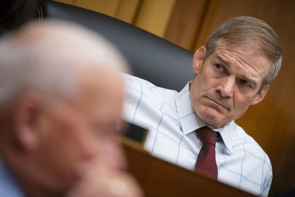 Representative Jim Jordan sits during a hearing.