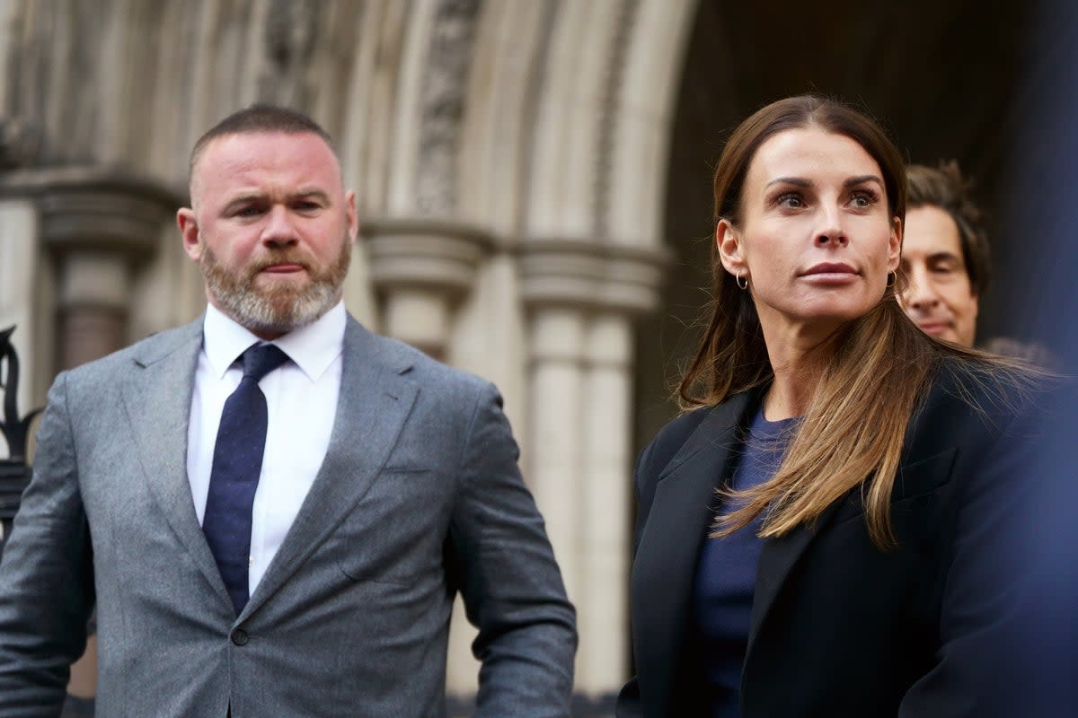 Wayne and Coleen Rooney leave the Royal Courts Of Justice (PA) (PA Wire)