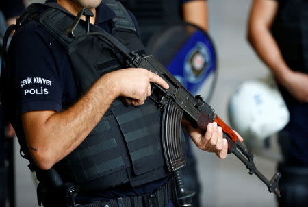 Police officer stands guard on a street near U.S. pastor Andrew Brunson's house in Izmir, Turkey October 12, 2018. REUTERS/Osman Orsal