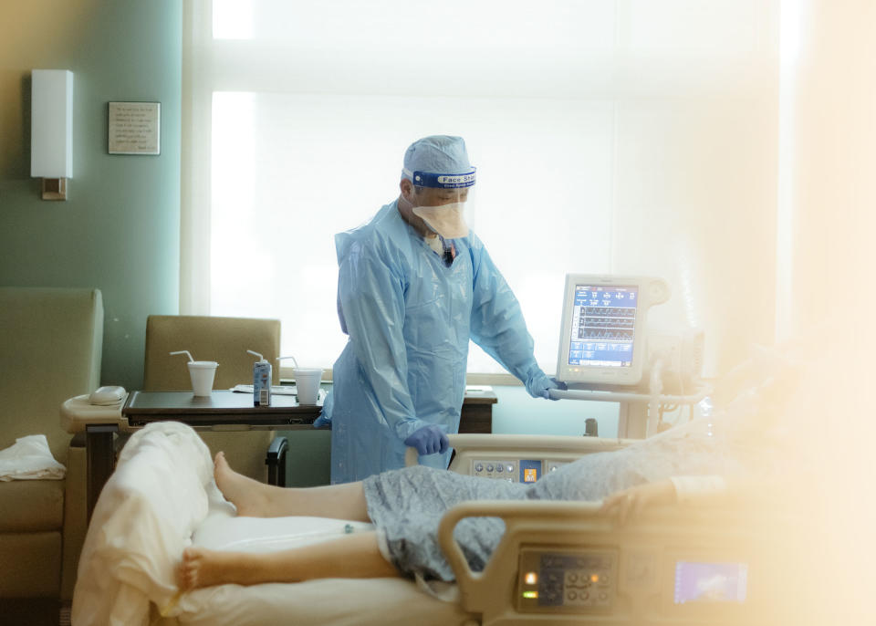 A nurse checks on a patient in the ICU Covid-19 ward at NEA Baptist Memorial Hospital in Jonesboro, Ark., on Aug. 4, 2021.<span class="copyright">Houston Cofield—Bloomberg/Getty Images</span>