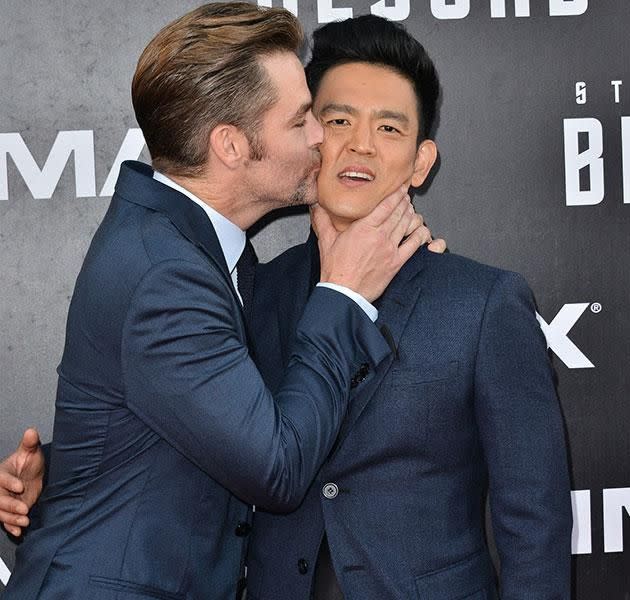 It wasn't all a solemn occasion. Costars Chris Pine and John Cho were snapped playing around on the red carpet of the US premiere. Source: Getty