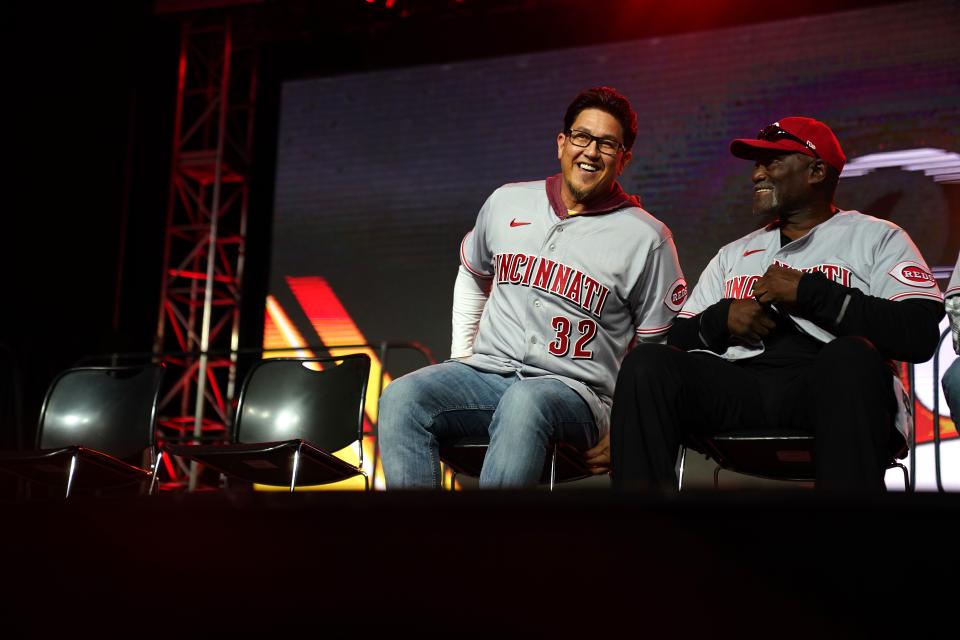 Former Cincinnati Reds players Danny Graves, left, and George Foster, right, share a laugh during Redsfest 2022. Graves will be a grand marshal during the 2023 Findlay Market Opening Day Parade.