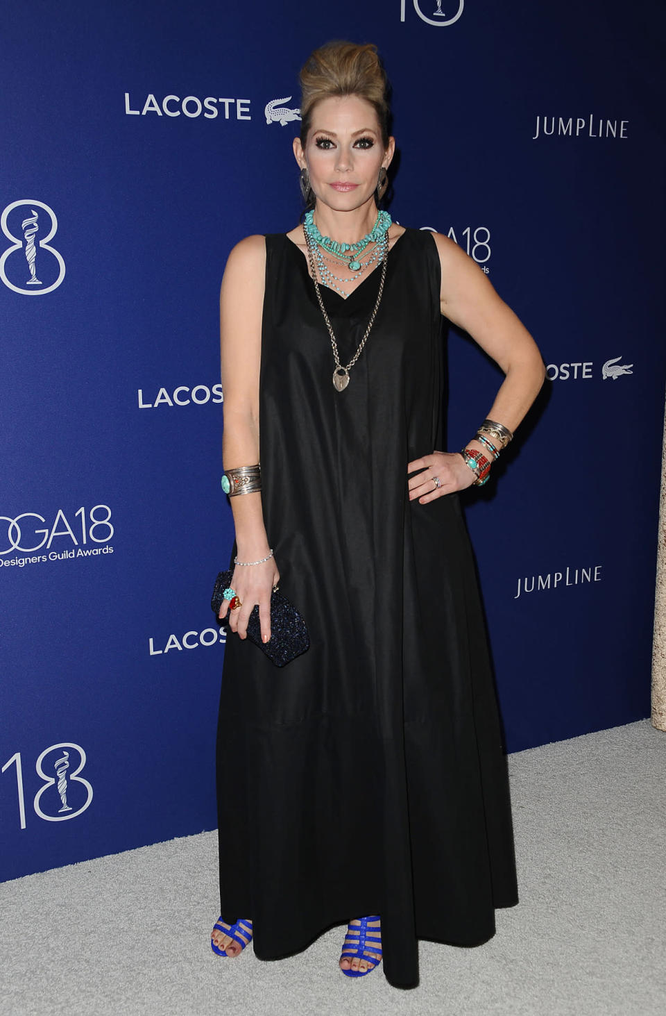 Meredith Monroe in a billowing black gown and turquoise necklaces at the 18th Costume Designers Guild Awards at the Beverly Hilton on Feb. 23, 2016, in Beverly Hills, Calif.