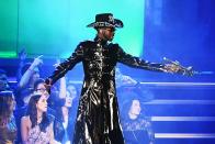 <p>For his performance on stage at the event, he went for a <em>Matrix</em>-inspired patent leather trench and an embroidered hat. </p>