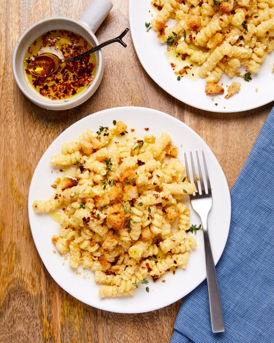 <p>This no-effort creamy ricotta pasta is topped with red chili oil and buttery bread crumbs. The extra effort to make your own <a href="https://www.delish.com/cooking/recipe-ideas/a37636403/how-to-make-breadcrumbs/" rel="nofollow noopener" target="_blank" data-ylk="slk:bread crumbs" class="link ">bread crumbs</a> and <a href="https://www.delish.com/cooking/recipe-ideas/a40050176/chili-oil-recipe/" rel="nofollow noopener" target="_blank" data-ylk="slk:chili oil" class="link ">chili oil</a> is well worth it for this simple pasta. You might want to top <em>all</em> your dinners with them from now on. 😉</p><p>Get the <strong><a href="https://www.delish.com/cooking/recipe-ideas/a35702140/red-chili-ricotta-pasta-recipe/" rel="nofollow noopener" target="_blank" data-ylk="slk:Red Chili Ricotta Pasta recipe" class="link ">Red Chili Ricotta Pasta recipe</a></strong>.</p>
