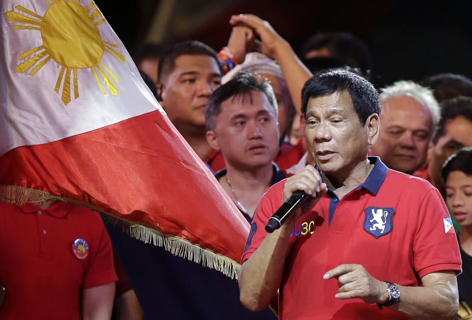 FILE PHOTO: Philippine presidential race front-runner Davao city mayor Rodrigo Duterte talks to the crowd during his final campaign rally in Manila, Philippines on Saturday, May 7, 2016. (AP Photo/Aaron Favila)