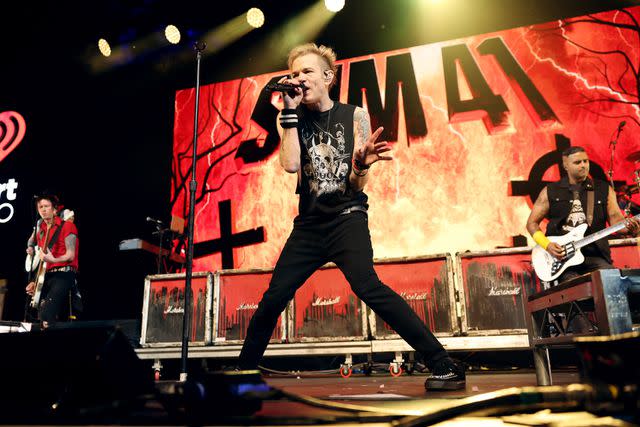 <p>Rich Polk/Getty Images for iHeartRadio</p> Sum 41 performs at the 2024 iHeartRadio ALTer EGO on Jan. 13, 2024 in Anaheim