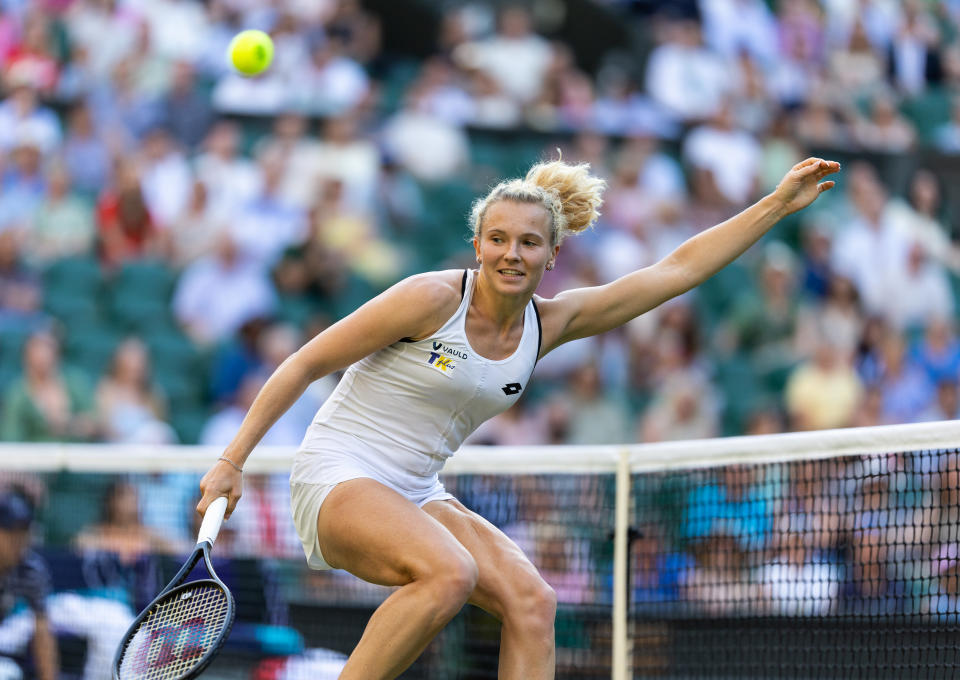 LONDON, ENGLAND - JULY 10: Katerina Siniakova of the Czech Republic in action with Barbora Krejcikova of the Czech Republic during the Ladies doubles Final against Elise Mertens of Belguim and Shuai Zhang of China (not pictured) at The Wimbledon Lawn Tennis Championship at the All England Lawn and Tennis Club at Wimbledon on July 10, 2022 in London, England. (Photo by Simon Bruty/Anychance/Getty Images)