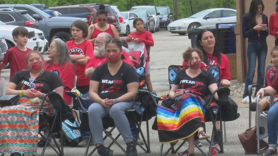 Attendees of the ceremonial circle on Red Dress Day at the Can-Am Indian Friendship Centre in Windsor on May 5, 2024.