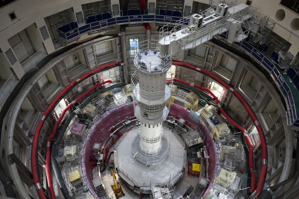 The ITER Tokamak machine is pictured in Saint-Paul-Lez-Durance, France, Thursday, Sept. 9, 2021. Scientists at the International Thermonuclear Experimental Reactor in southern France took delivery of the first part of a massive magnet so strong its American manufacturer claims it can lift an aircraft carrier. (AP Photo/Daniel Cole)