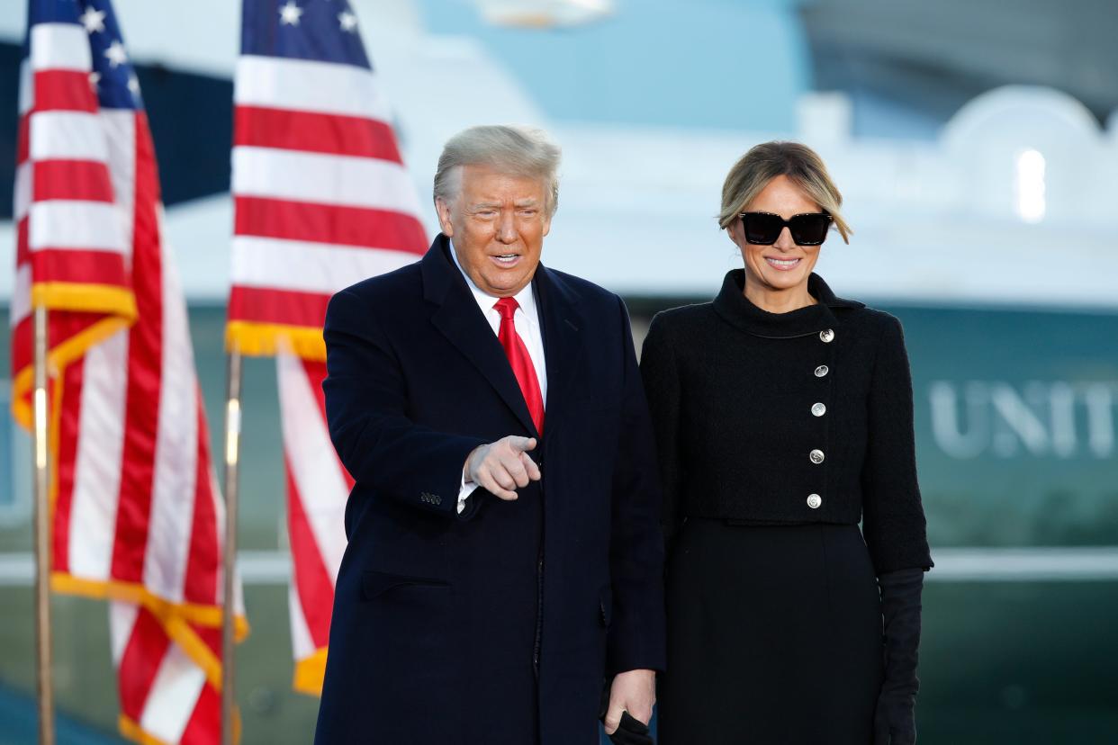 <p>Donald and Melania Trump greeting supporters at Andrews Air Force Base before leaving for Florida</p> (AP)