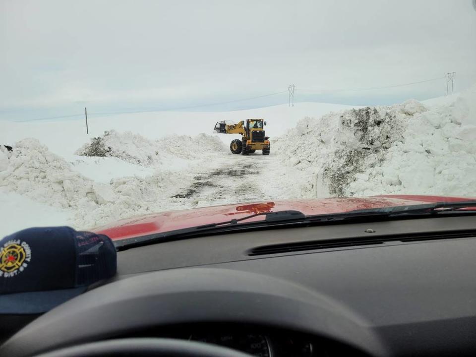 Walla Walla County Fire District 8 Chief Robert Clendaniel took this photo of the work being done by Walla Walla County Public Works employees to clear the impassable roads after this week’s drifting snow.