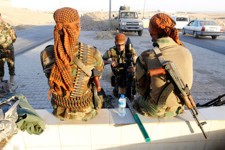 Kurdish Peshmerga fighters gather north of Kirkuk, Iraq October 19, 2017. REUTERS/Ako Rasheed