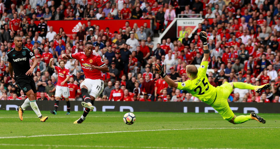 Manchester United’s Anthony Martial scores their third goal
