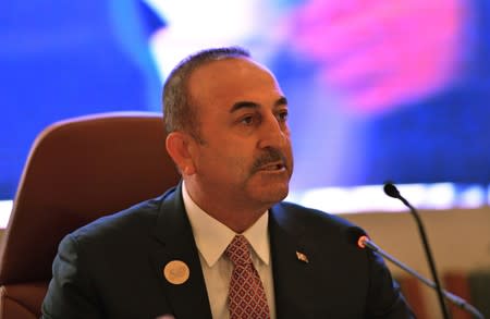 Foreign Minister of Turkey Mevlut Cavusoglu speaks during a preparatory meeting for the GCC, Arab and Islamic summits in Jeddah