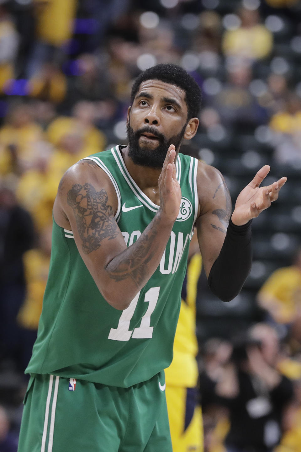 Boston Celtics' Kyrie Irving reacts during the second half of Game 3 of the team's NBA basketball first-round playoff series against the Indiana Pacers, Friday, April 19, 2019, in Indianapolis. Boston won 104-96. (AP Photo/Darron Cummings)