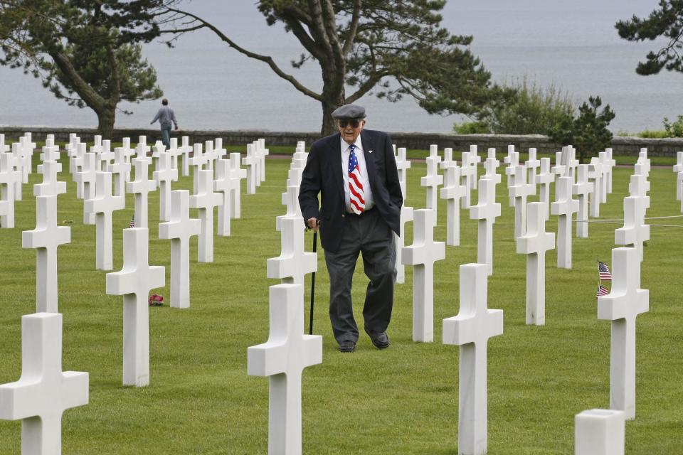 U.S. Vietnam veteran Sam Focer, 78, from Atlanta, Georgia, who fought with the 11th armored cavalry regiment,  walks among tombs at the Colleville American military cemetery, in Colleville sur Mer, western France, Wednesday  June 6, 2012, during the commemoration of the 68th anniversary of the D-Day.(AP Photo/Remy de la Mauviniere)