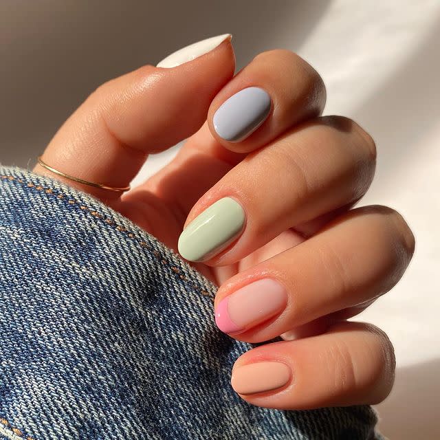<p>It may seem like a lot to paint all of your nails a different color, but if you stick to subtle pastel shades, they'll look sweet. To add even more intrigue, go for a french tip as an accent nail. </p><p><a href="https://www.instagram.com/p/CLpuzMJLcB4/&hidecaption=true" rel="nofollow noopener" target="_blank" data-ylk="slk:See the original post on Instagram;elm:context_link;itc:0;sec:content-canvas" class="link ">See the original post on Instagram</a></p>