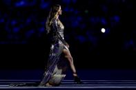 <p>Supermodel Gisele Bundchen walks as The Girl From Ipanema during the Bossa segment during the Opening Ceremony of the Rio 2016 Olympic Games at Maracana Stadium on August 5, 2016 in Rio de Janeiro, Brazil. (Photo by Jamie Squire/Getty Images) </p>