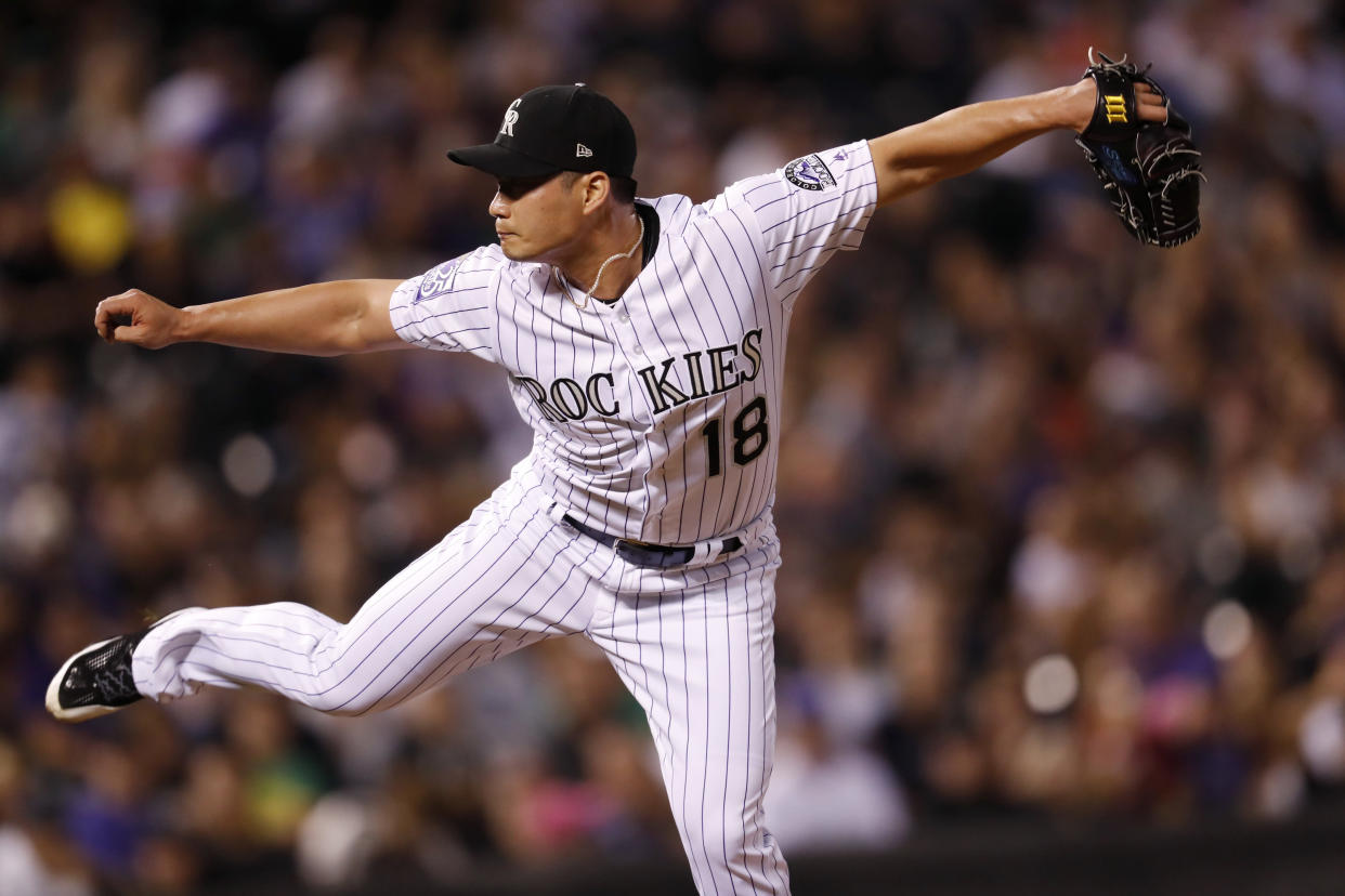 Seunghwan Oh has a new number now that he’s with the Rockies. (AP Photo/David Zalubowski)