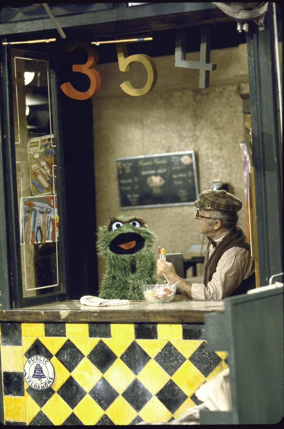 Actor Will Lee chats with Oscar the Grouch during a scene that aired in the show's premiere season.