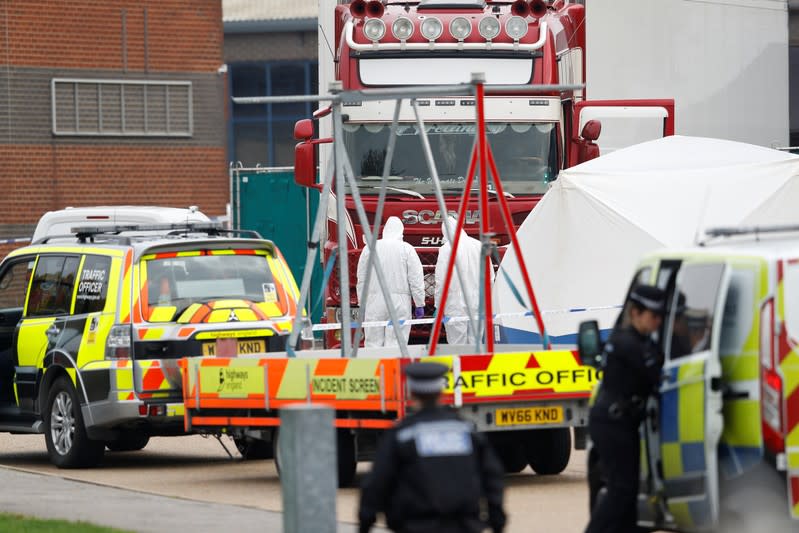 The scene where bodies were discovered in a lorry container, in Grays, Essex