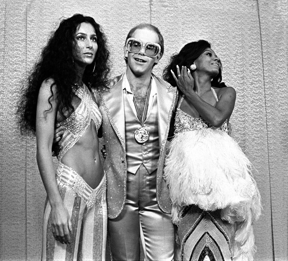 Cher, Elton John and Diana Ross at the Rock Awards in 1975. (Getty Images)
