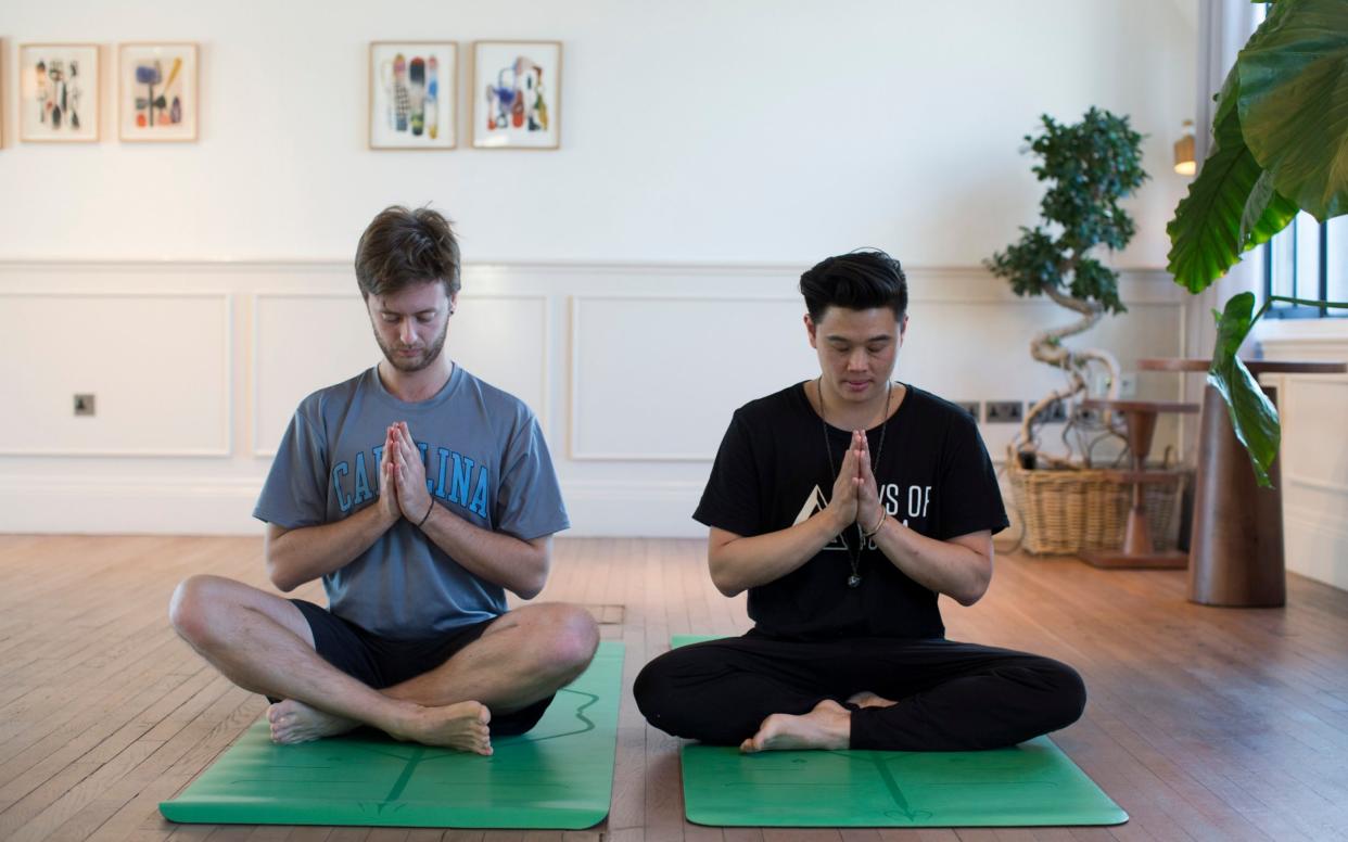 Michael James Wong encouraging Tomé Morrissy-Swan to try yoga  - Jeff Gilbert