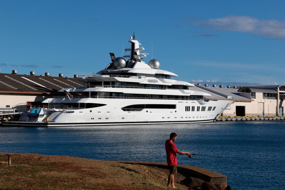 The superyacht Amadea is moored in Honolulu on Thursday, June 16, 2022. A Russian-owned superyacht seized by the United States arrived in Honolulu Harbor flying a U.S. flag after the U.S. last week won a legal battle in Fiji to take the $325 million vessel.