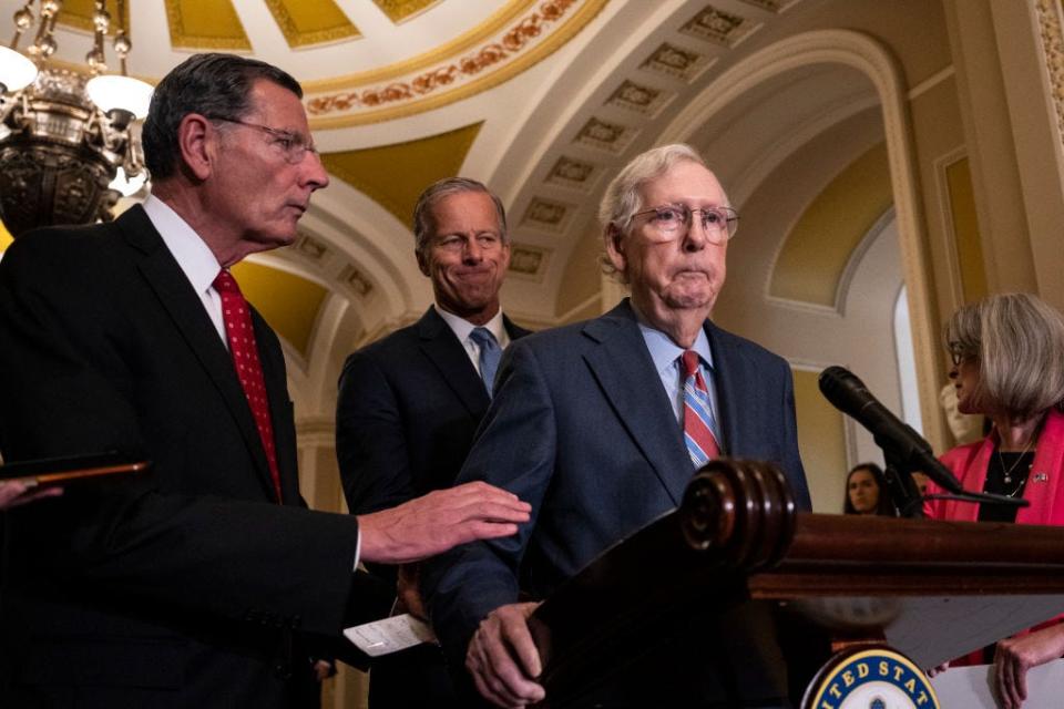 en. John Barrasso (R-WY) reaches out to help Senate Minority Leader Mitch McConnell (R-KY) after McConnell froze and stopped talking