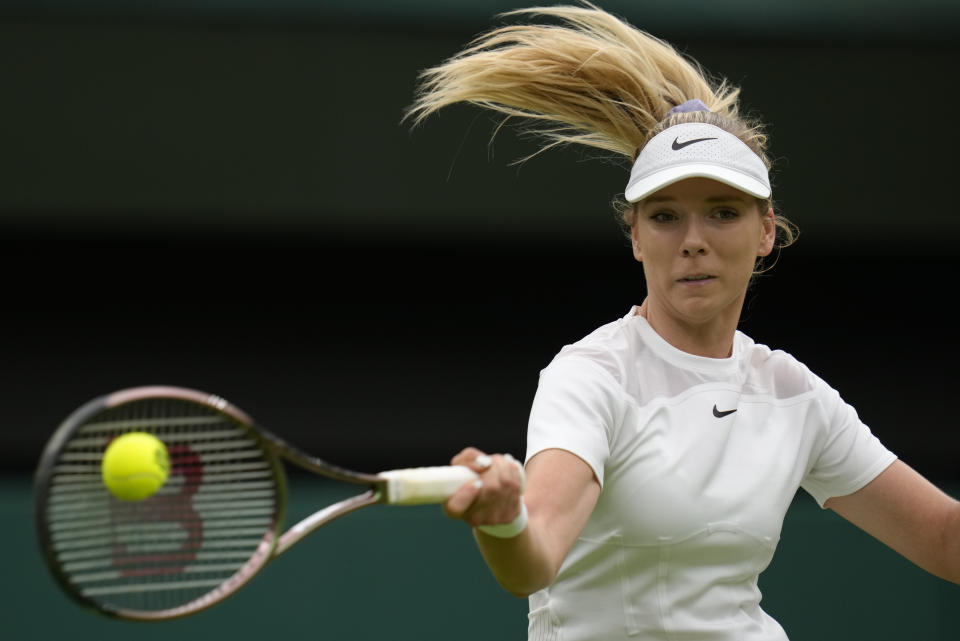 Britain's Katie Boulter returns to Karolina Pliskova of the Czech Republic in a second round women's singles match on day four of the Wimbledon tennis championships in London, Thursday, June 30, 2022. (AP Photo/Kirsty Wigglesworth)