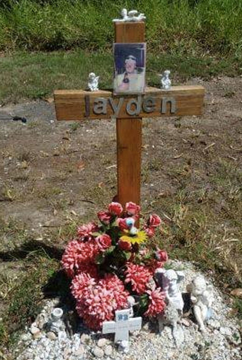 Jayden’s family set up a memorial west of Noosa with a photo of Jayden and a cross, but it has since been taken away. Photo: Facebook/ Julie Watts