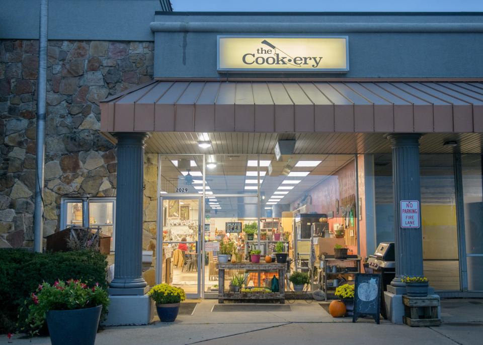 The Cookery in Morton's Field Shopping Center is lit up for an evening cooking class.