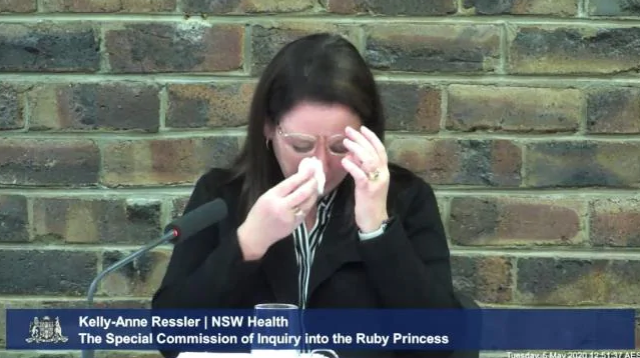 Ms Ressler is seen crying after Commissioner Bret Walker SC suggested there'd been a "reprehensible shortcoming" by the department. Source: ABC