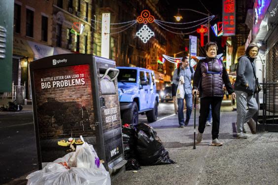 Bin in New York's Chinatown warns 'a little litter can lead to big problems' (Stephen Speranza/The New York Times)