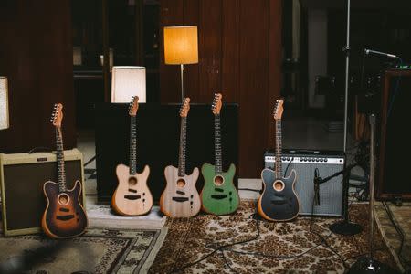 FILE PHOTO: Several models of Fender Musical Instruments Corporation's American Acoustasonic Series Telecaster guitar in Corona, California, U.S., are shown in this photo provided January 18, 2019. Fender Musical Instruments Corp/Handout via REUTERS