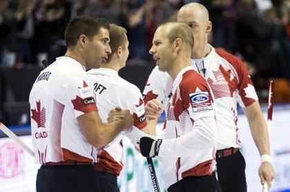 Canada skip Pat Simmons celebrates with his team John Morris (L), Carter Rycroft (2nd L), and Nolan Thiessen (R) after defeating the U.S. during the second draw of the World Men&#39;s Curling Championships in Halifax, Nova Scotia, March 28, 2015. REUTERS/Mark Blinch