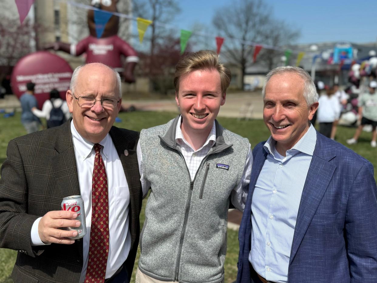Clif Smart, president of Missouri State; Bradley Cooper, student member of MSU Board of Governors; and John Jasinski, provost, at the university's birthday party.