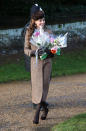 The Duchess of Cambridge was laden-down with flowers when she showed up at church in 2014. Photo: Getty Images