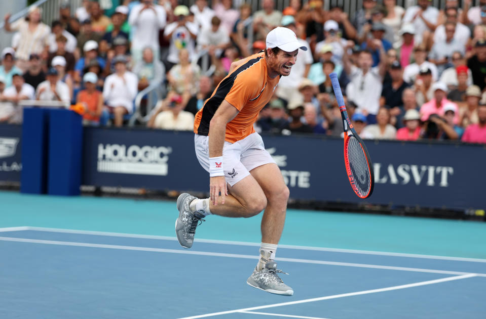 MIAMI GARDENS, FLORIDA - MARCH 24:  Andy Murray of Great Britain screams in pain after hurting his left ankle during his match against Tomas Machac of the Czech Republic on Day 9 of the Miami Open at Hard Rock Stadium on March 24, 2024 in Miami Gardens, Florida. (Photo by Al Bello/Getty Images)