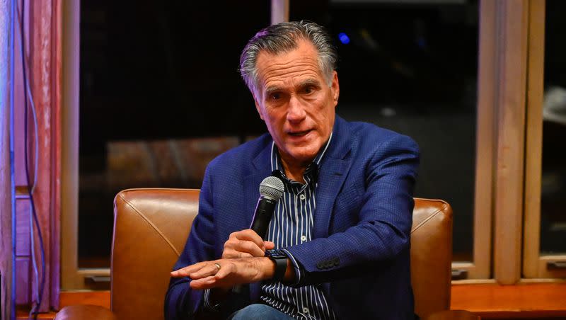 Sen. Mitt Romney, R-Utah, speaks with former Speaker of the House Paul Ryan, R-Wis., during the E2 Summit at Stein Eriksen Lodge on Tuesday, Oct. 10, 2023, in Park City.