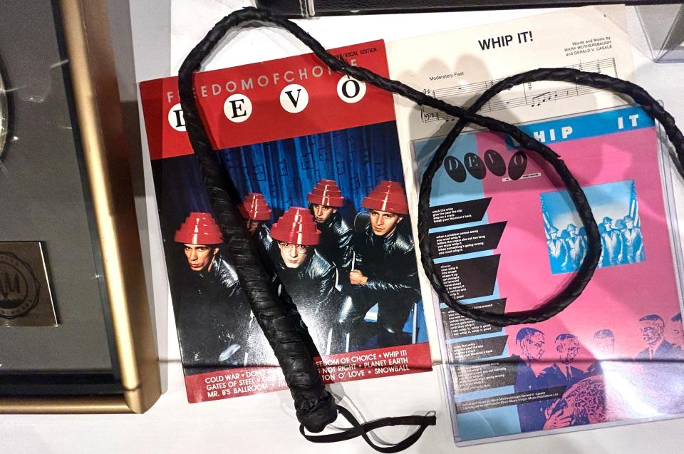 This whip was used in Devo's iconic 1980 music video for "Whip It." It's part of a dedicated "Whip It" display case in the Rauschenberg Gallery exhibit "Devo 5-0."