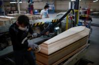 Business booms for France's biggest coffin-maker as coronavirus rips through the country