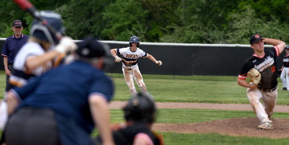 Whiteford's Ryin Ruddy attempts to get a big lead off second base as Jacob Wadsworth of Summerfield delivers a pitch Friday.