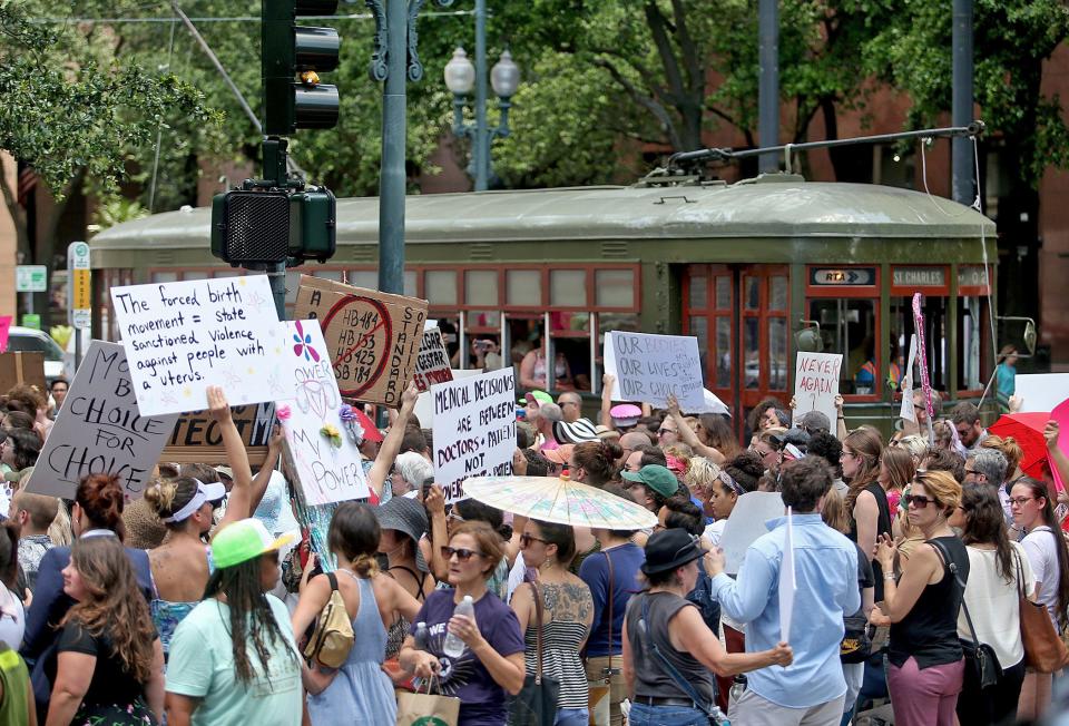 Hundreds of abortion-rights advocates gather to protest anti-abortion legislation during a Just Laws or Outlaws: Take to the Streets event organized by New Orleans Abortion Fund, Women With a Vision, the New Orleans Peoples' Assembly, and BYP 100 on Wednesday, May 22, 2019 in New Orleans. (Michael DeMocker/NOLA.com | The Times-Picayune via AP)